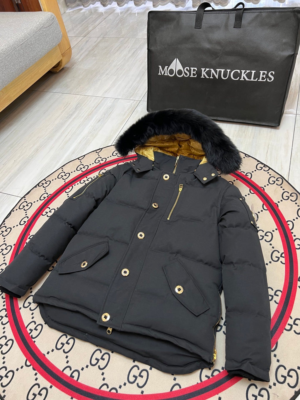 Moose Knuckles Men's Black Hooded Jacket with Gold-Tone Details